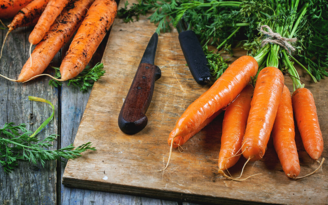 Ducks waddling through tall grass